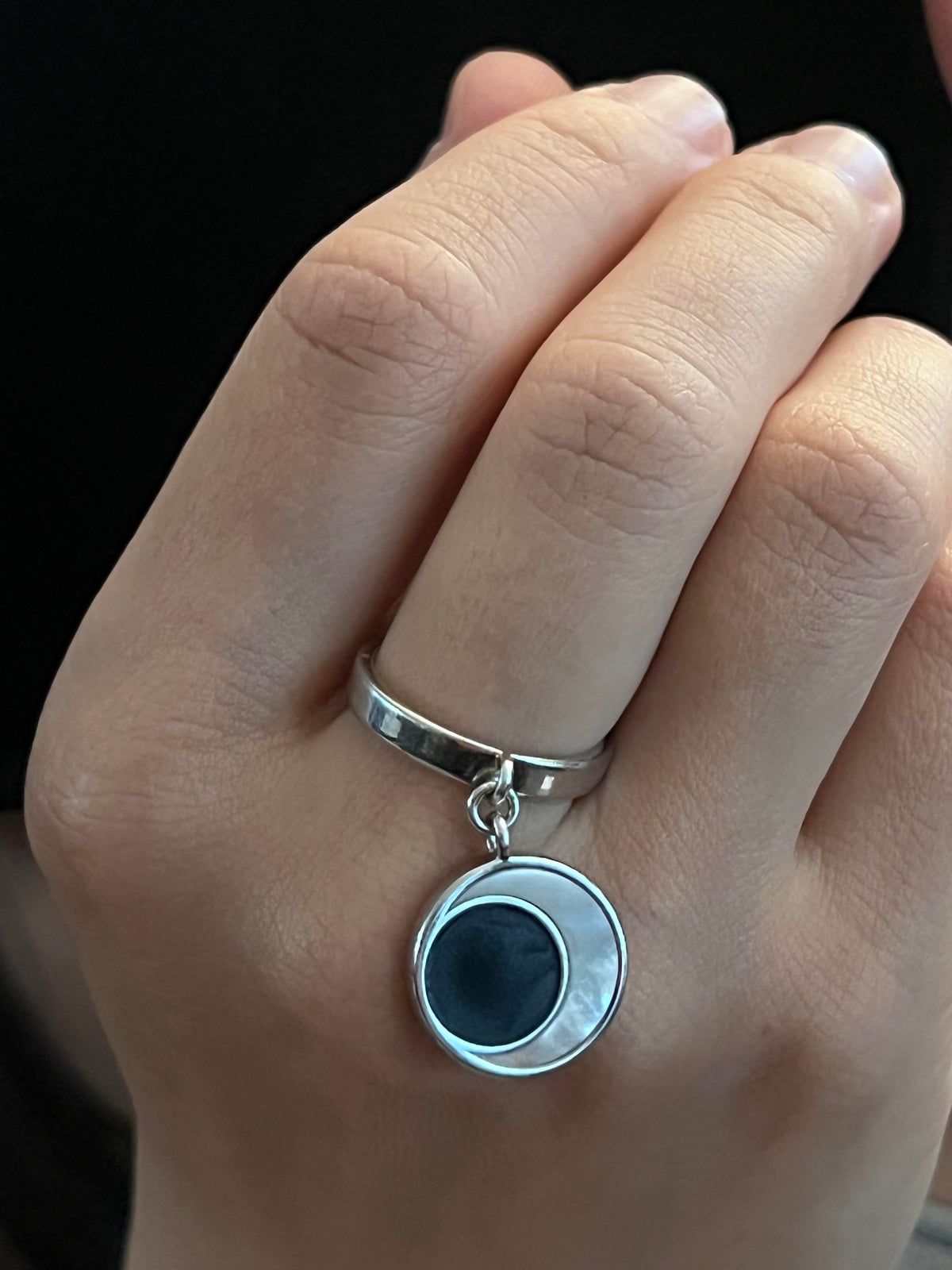 Eclipse Ring worn on hand